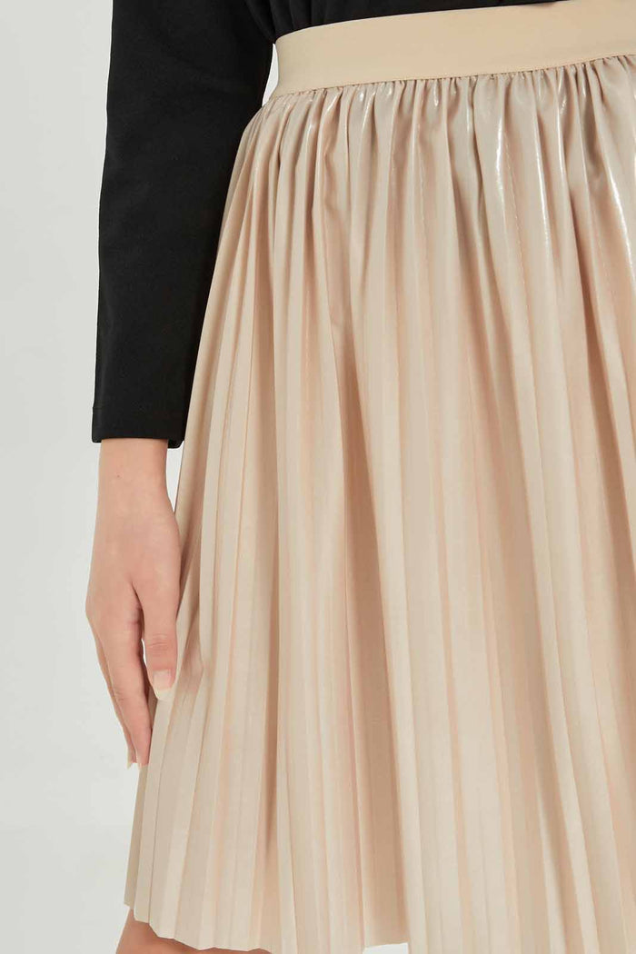 Redtag-Girls-Beige-Pleated-Pu-Skirts-Category:Skirts,-Colour:Beige,-Deals:New-In,-Dept:Girls,-Filter:Senior-Girls-(8-to-14-Yrs),-GSR-Skirts,-New-In-GSR-APL,-Non-Sale,-S23A,-Section:Girls-(0-to-14Yrs)-Senior-Girls-9 to 14 Years