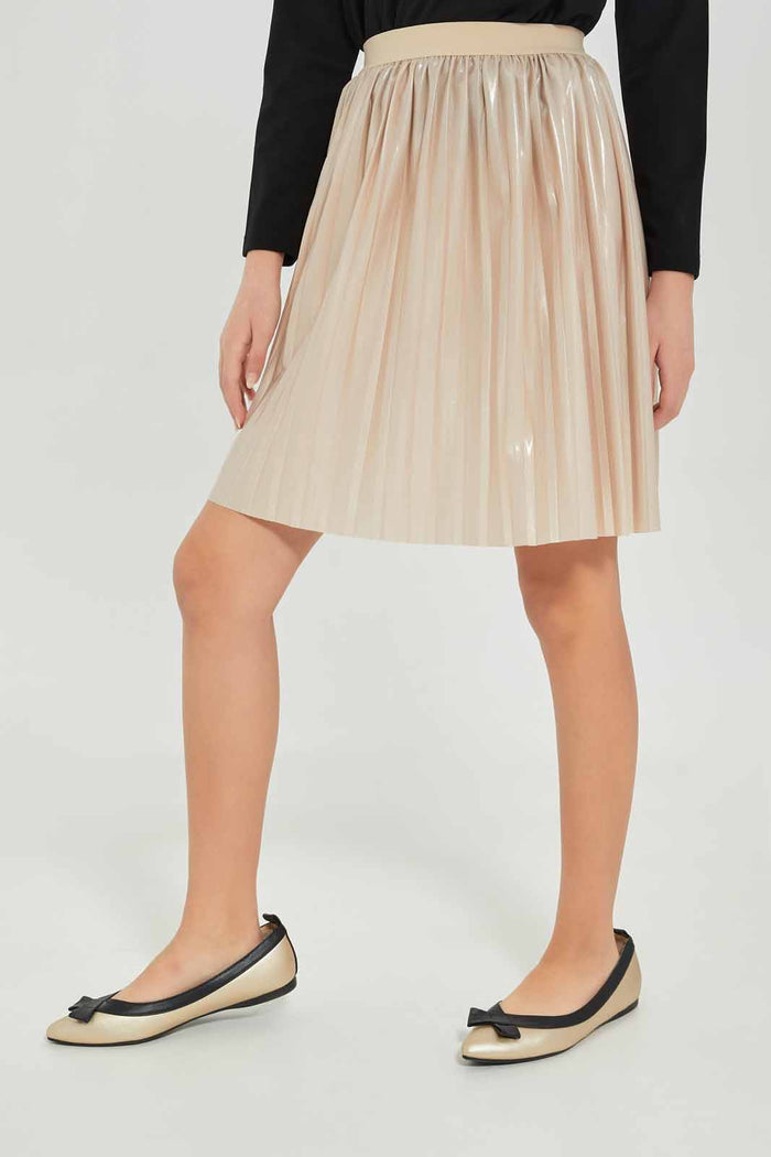 Redtag-Girls-Beige-Pleated-Pu-Skirts-Category:Skirts,-Colour:Beige,-Deals:New-In,-Dept:Girls,-Filter:Senior-Girls-(8-to-14-Yrs),-GSR-Skirts,-New-In-GSR-APL,-Non-Sale,-S23A,-Section:Girls-(0-to-14Yrs)-Senior-Girls-9 to 14 Years