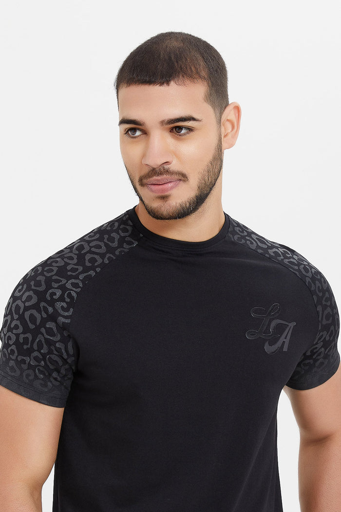 Redtag-Black-Reglan-T-Shirt-Category:T-Shirts,-Colour:Black,-Deals:New-In,-Filter:Men's-Clothing,-H1:MWR,-H2:GEN,-H3:TSH,-H4:TSH,-Men-T-Shirts,-New-In-Men,-Non-Sale,-ProductType:Graphic-T-Shirts,-S23E,-Season:S23E,-Section:Men-Men's-